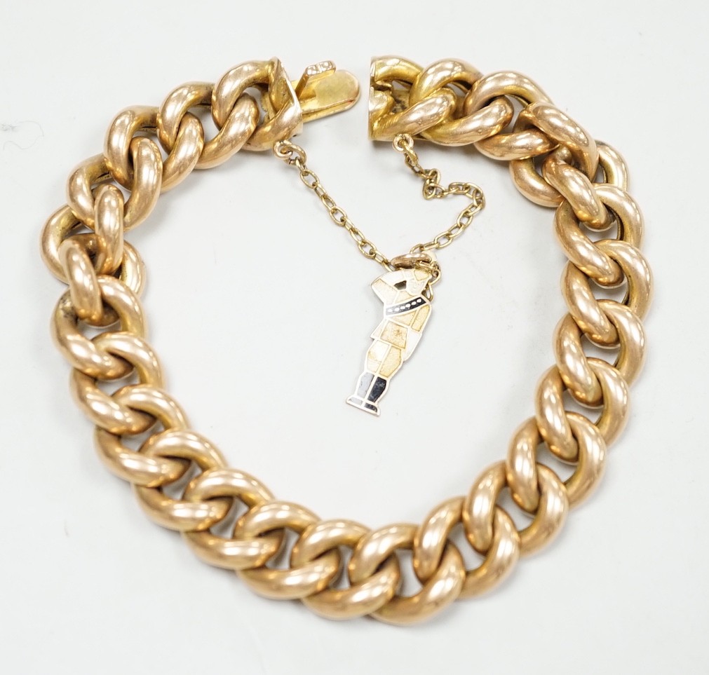 An early 20th century 15ct curb link bracelet, with later 9ct gold charm, 17cm, gross weight 26.5 grams.